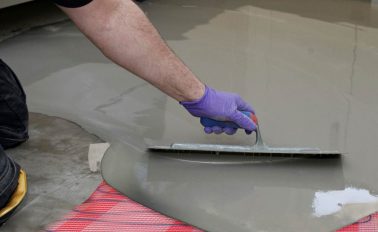 ARDITEX NA levelling and smoothing compound going over underfloor heating elements