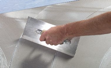 Application of lino adhesive