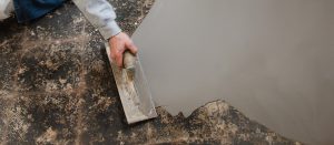 Self levelling compound over old bitumen residue floor without the need to prime