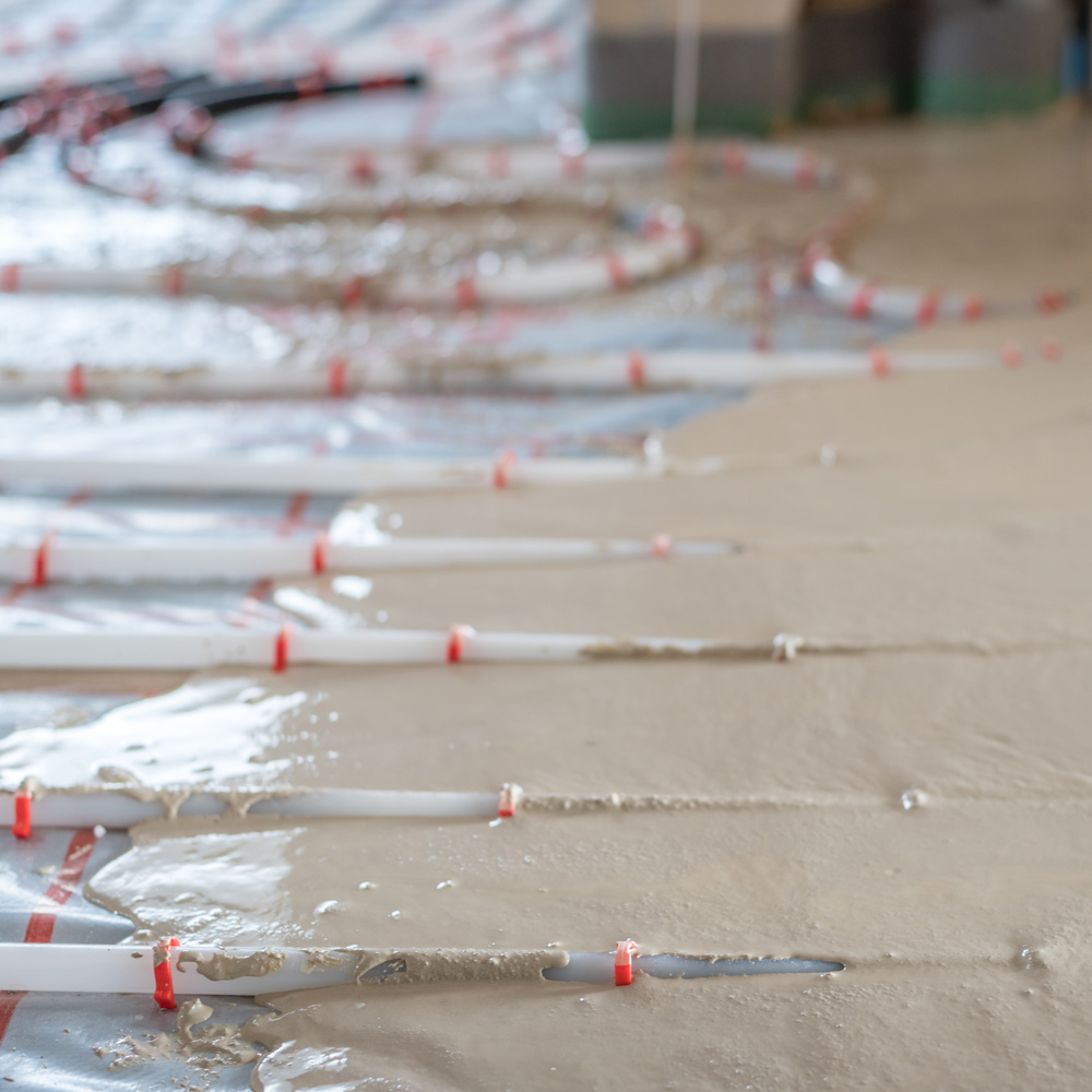 Ardex A 70 Gypflo liquid screed over heating pipes
